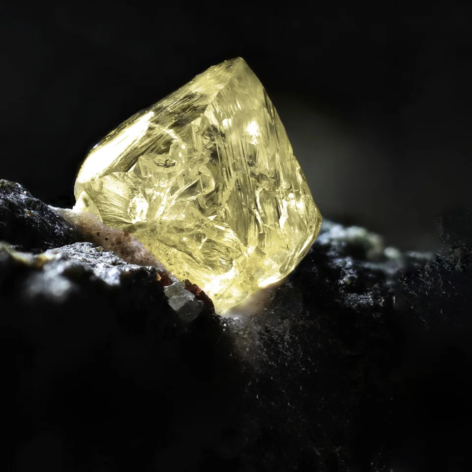 Rough natural yellow diamond crystal
